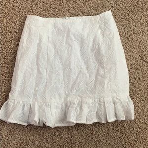 tight white skirt, ruffles at the bottom!